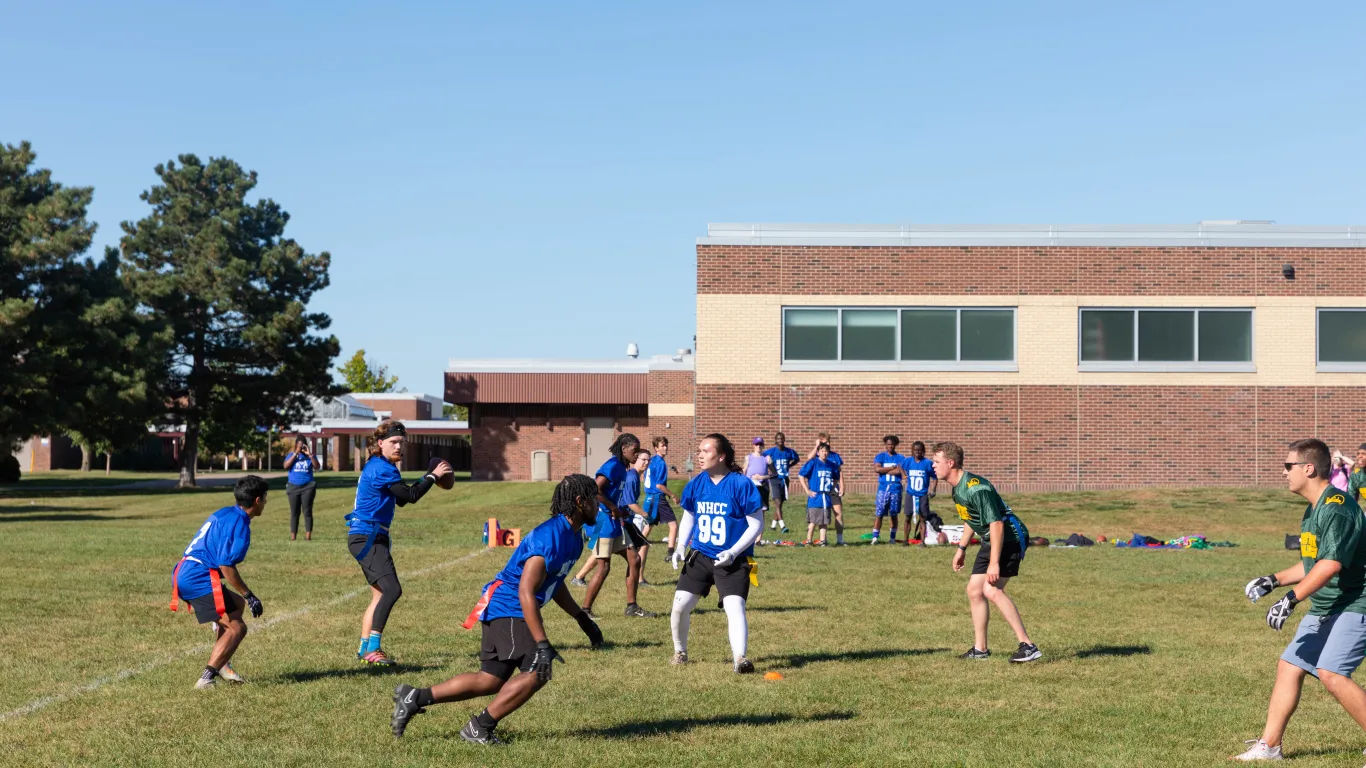 people in field for flag football