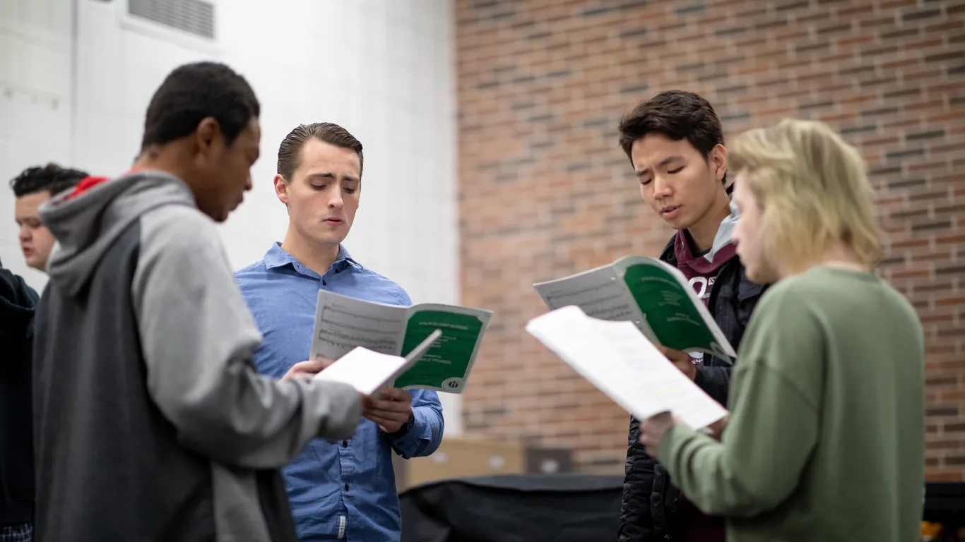 students singing together in a classroom