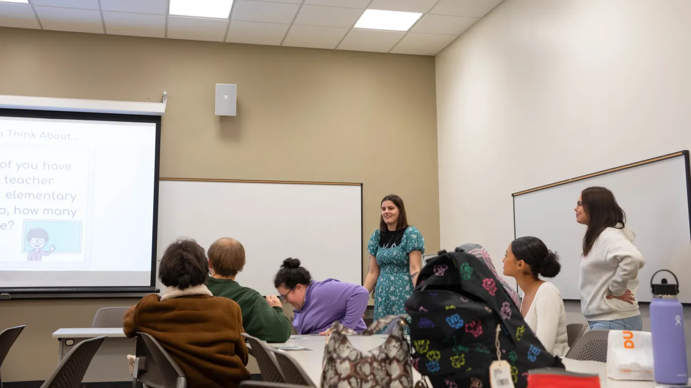 a student presenting in a classroom