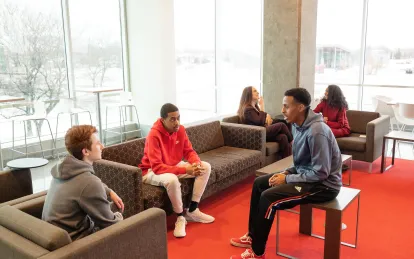 students talking in a lounge