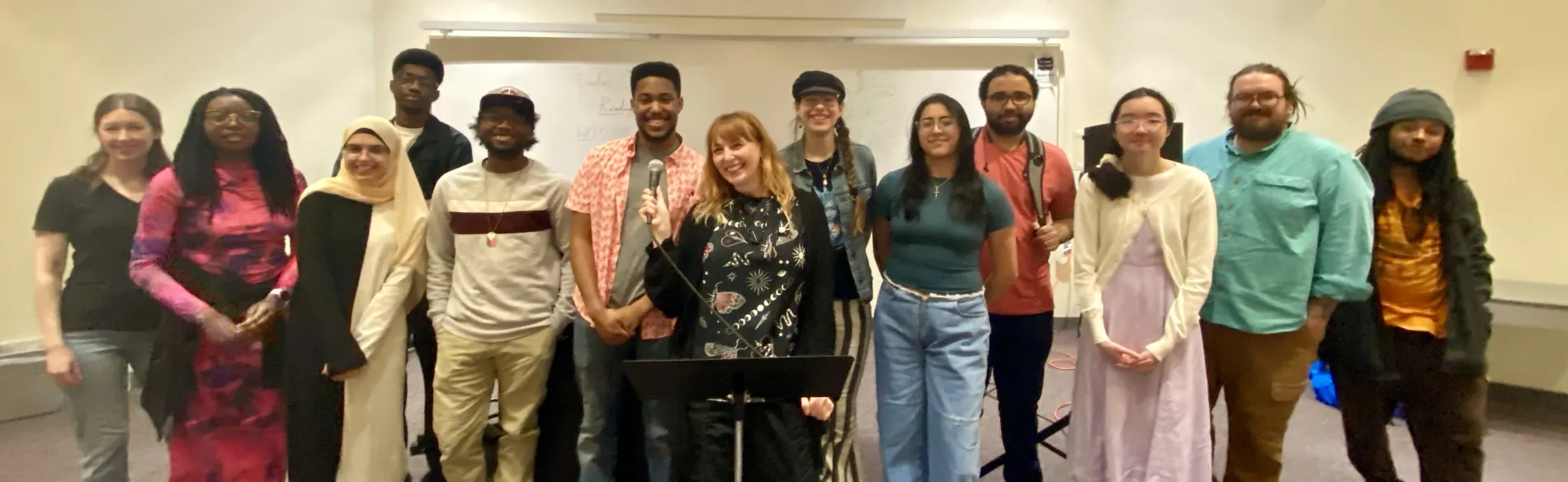 a group of students standing and smiling