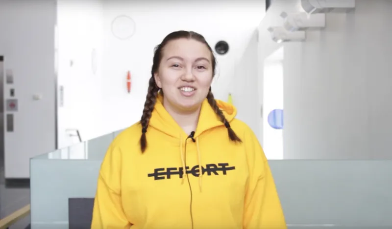 female student inside talking