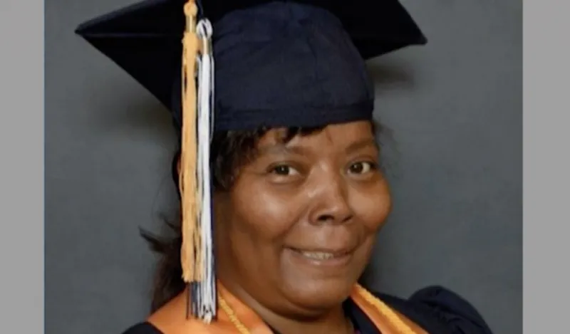 alumni Deb Fortney posing for her graduation phot 