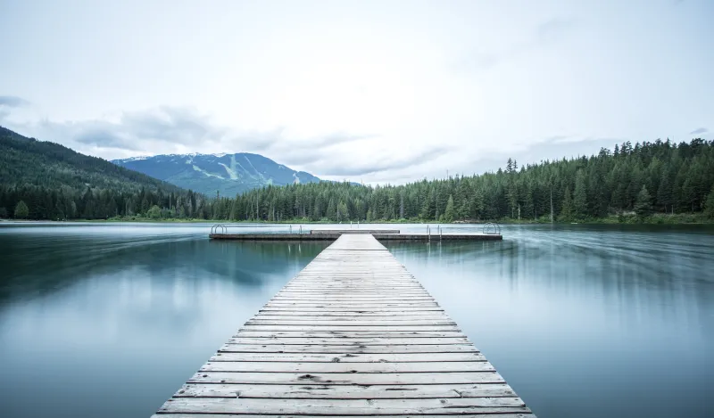 a photo of mountains and water symbolizing peace 