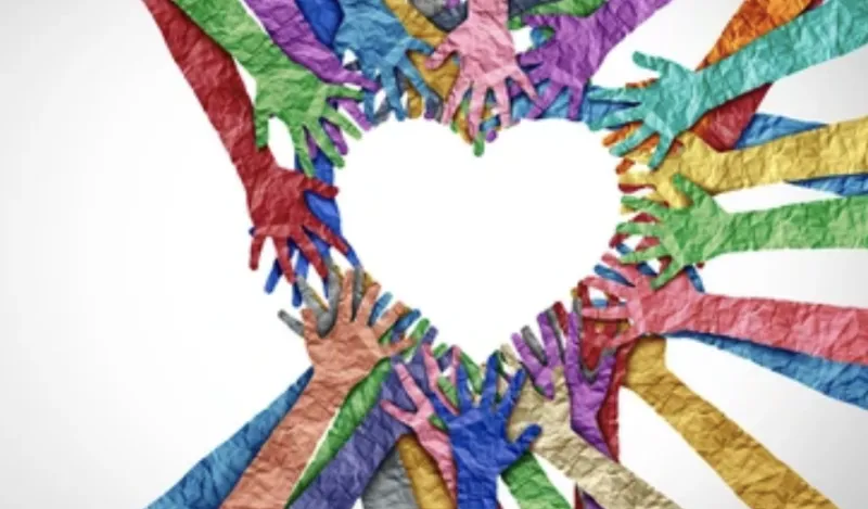 colorful hands connecting to form a heart shape