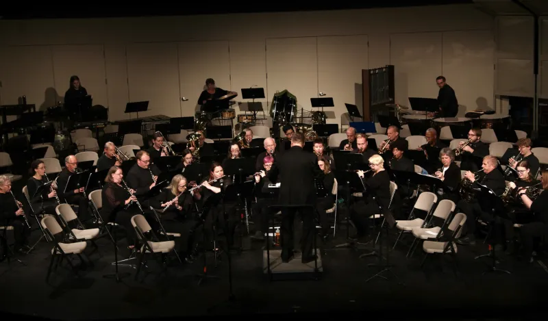 Concert photo of Dave conducting. 