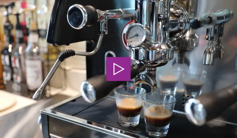 This is a photo of two glasses of espresso being poured from Murphy Micro Roast in the Coffee Shop at NHCC.