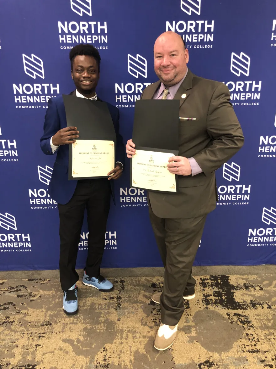 NHCC President, Dr. Garcia and Student Senate President, Sylvester Jah with their award certificates