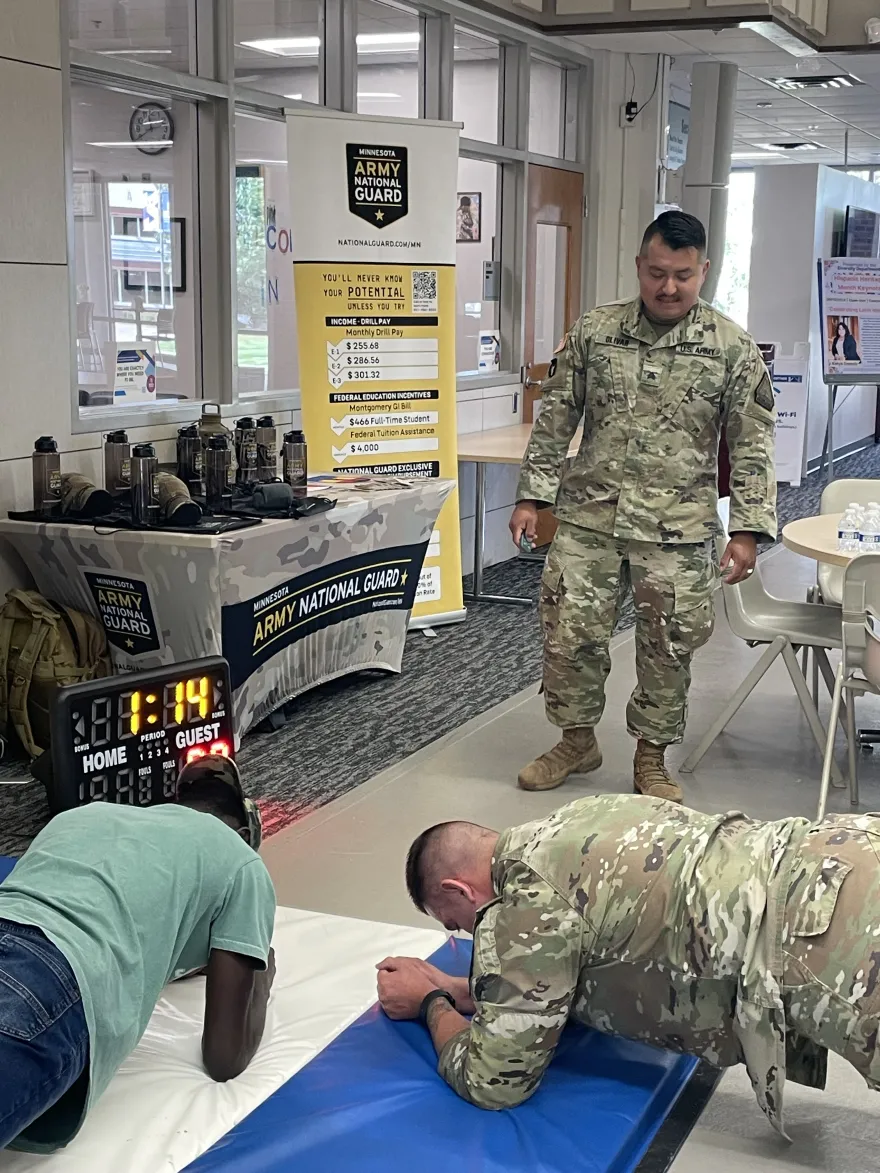 a photo of a student in a plank competition on-campus