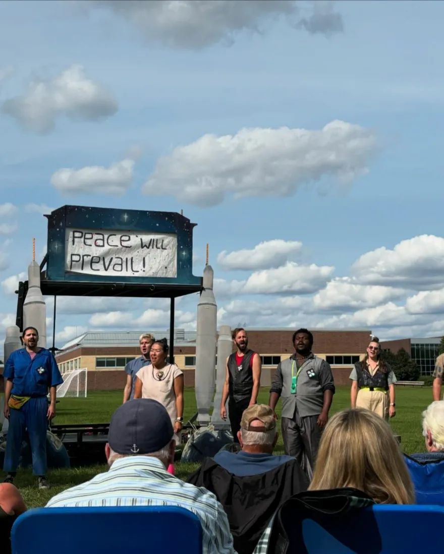 a photo of a play being held outside at NHCC