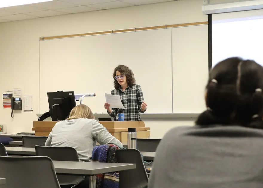 a photo of NHCC faculty, Kara Olson teaching a poetry class