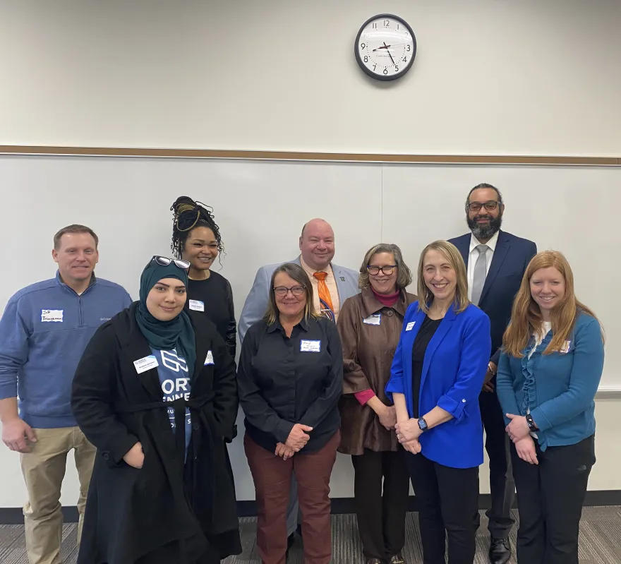 a group photo of representatives from NHCC with Hennepin Technical College employees at the 2025 Legislative Breakfast.